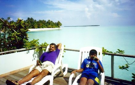 Relaxing at an island resort in Maldives with Dad